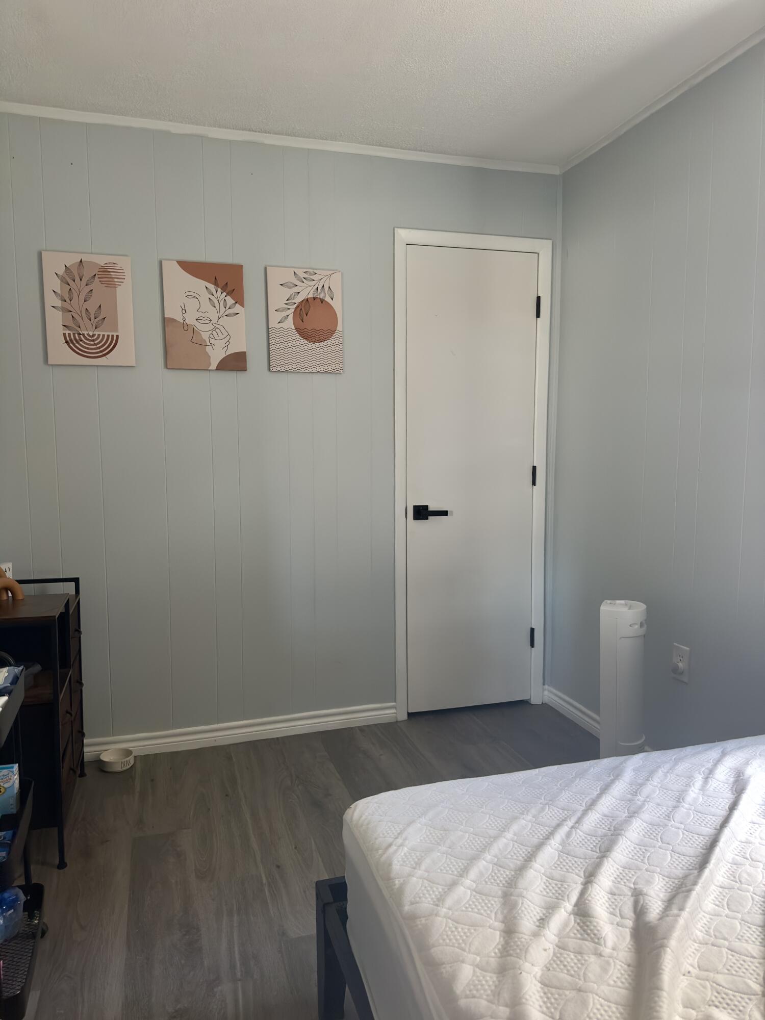 4807 39th Street Lubbock, TX 79414 - Photo 9 of 29 a bedroom with a bed and a table