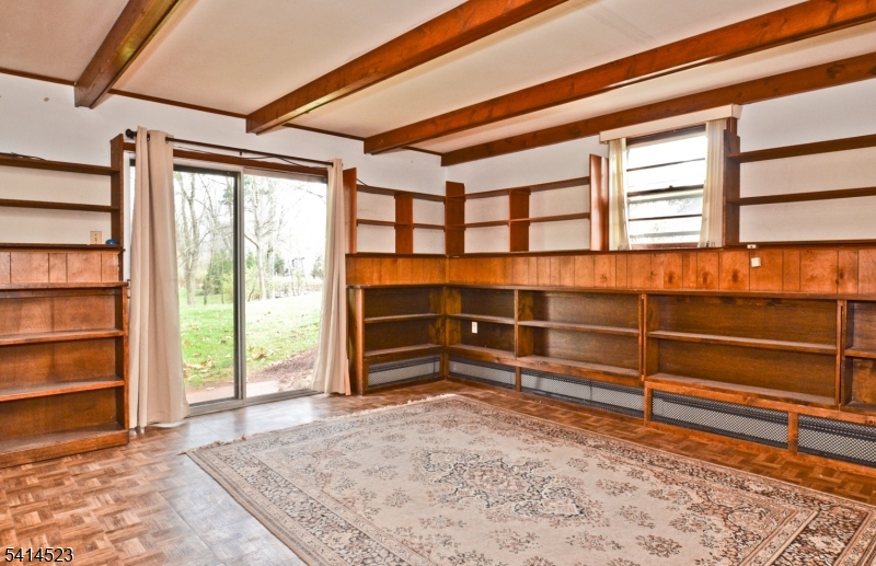19 Jamestown Road Belle Mead, NJ 08502 - Photo 9 of 22 a view of a room with wooden floor and windows
