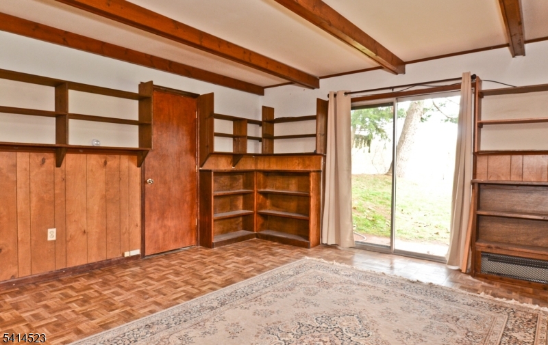19 Jamestown Road Belle Mead, NJ 08502 - Photo 10 of 22 a view of a room with wooden floor and windows
