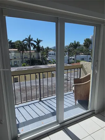 a view of balcony and a potted plant