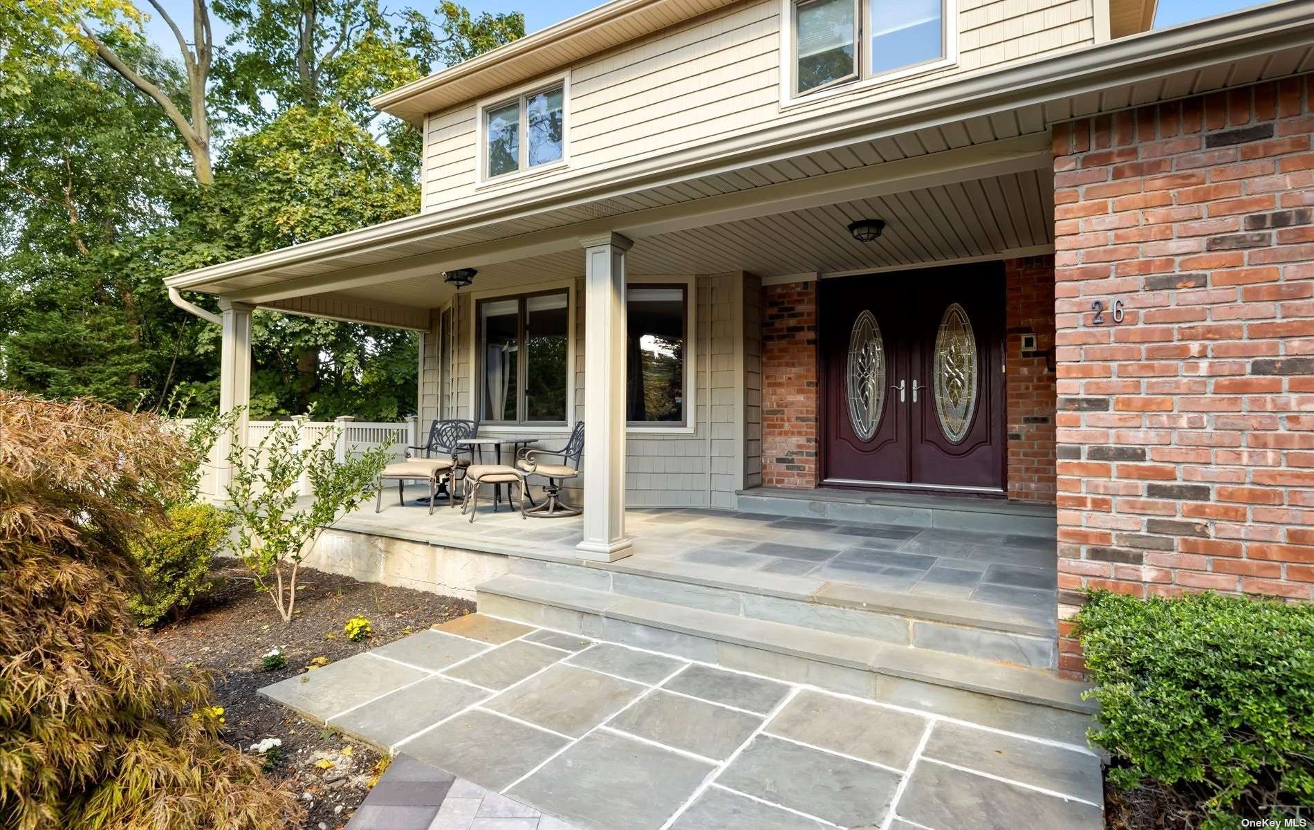26 Dryden Way Commack, NY 11725 - Photo 1 of 1 a view of a entryway door front of house