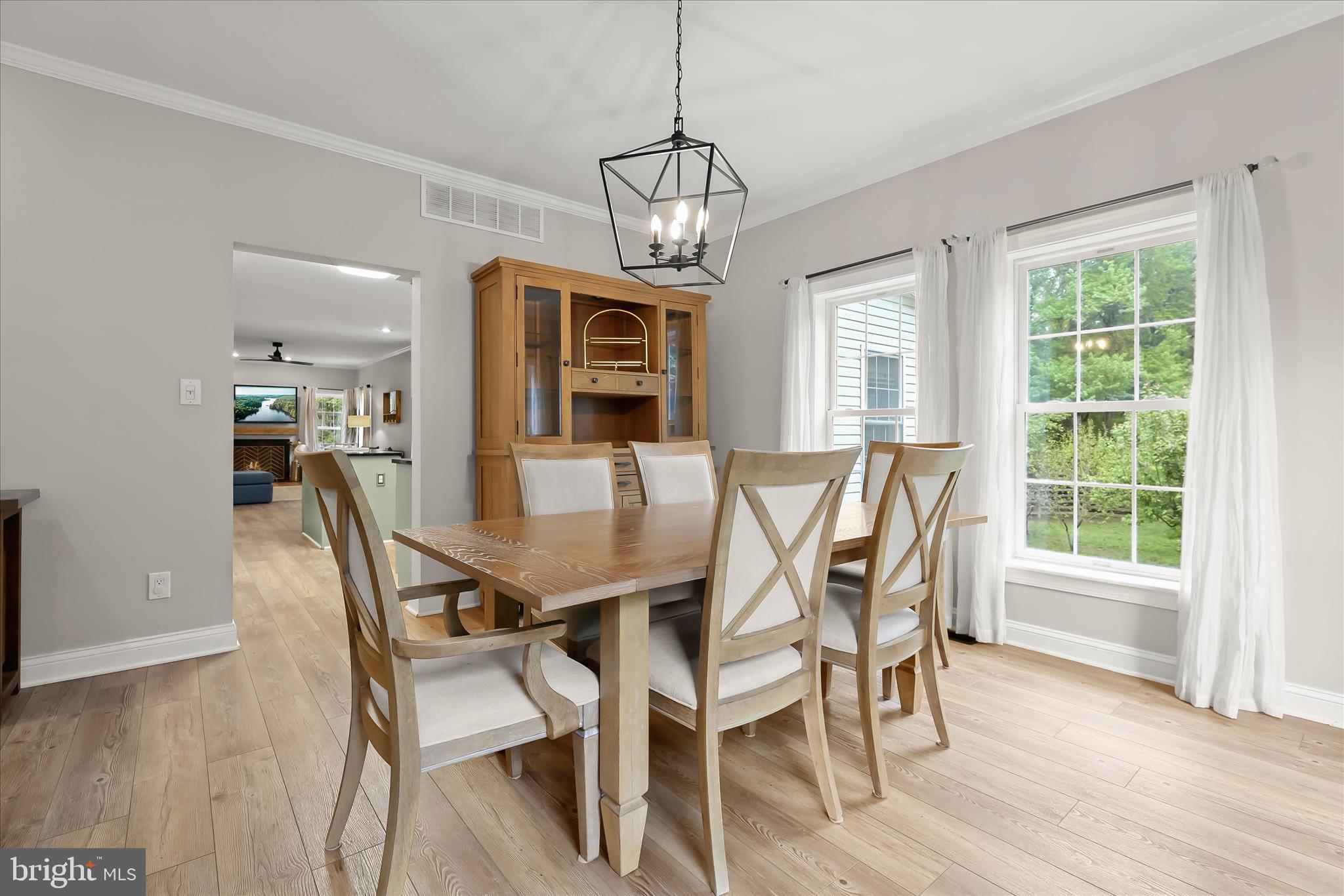 515 Garrison Forest Road Owings Mills, MD 21117 - Photo 11 of 84 a view of a dining room with furniture window and wooden floor