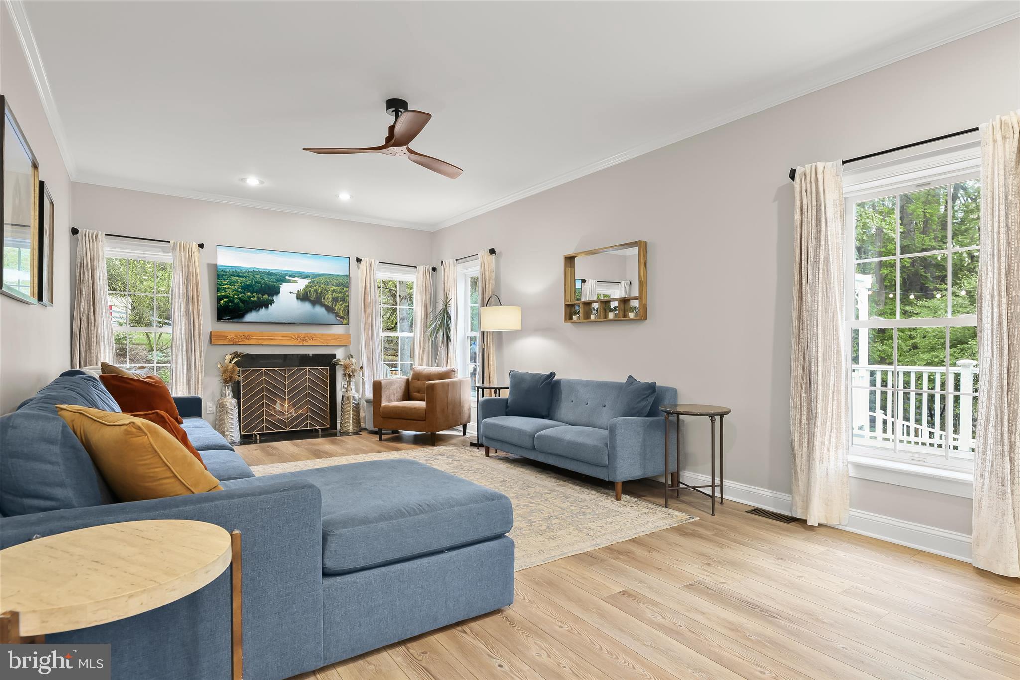 515 Garrison Forest Road Owings Mills, MD 21117 - Photo 29 of 84 a living room with furniture and a fireplace