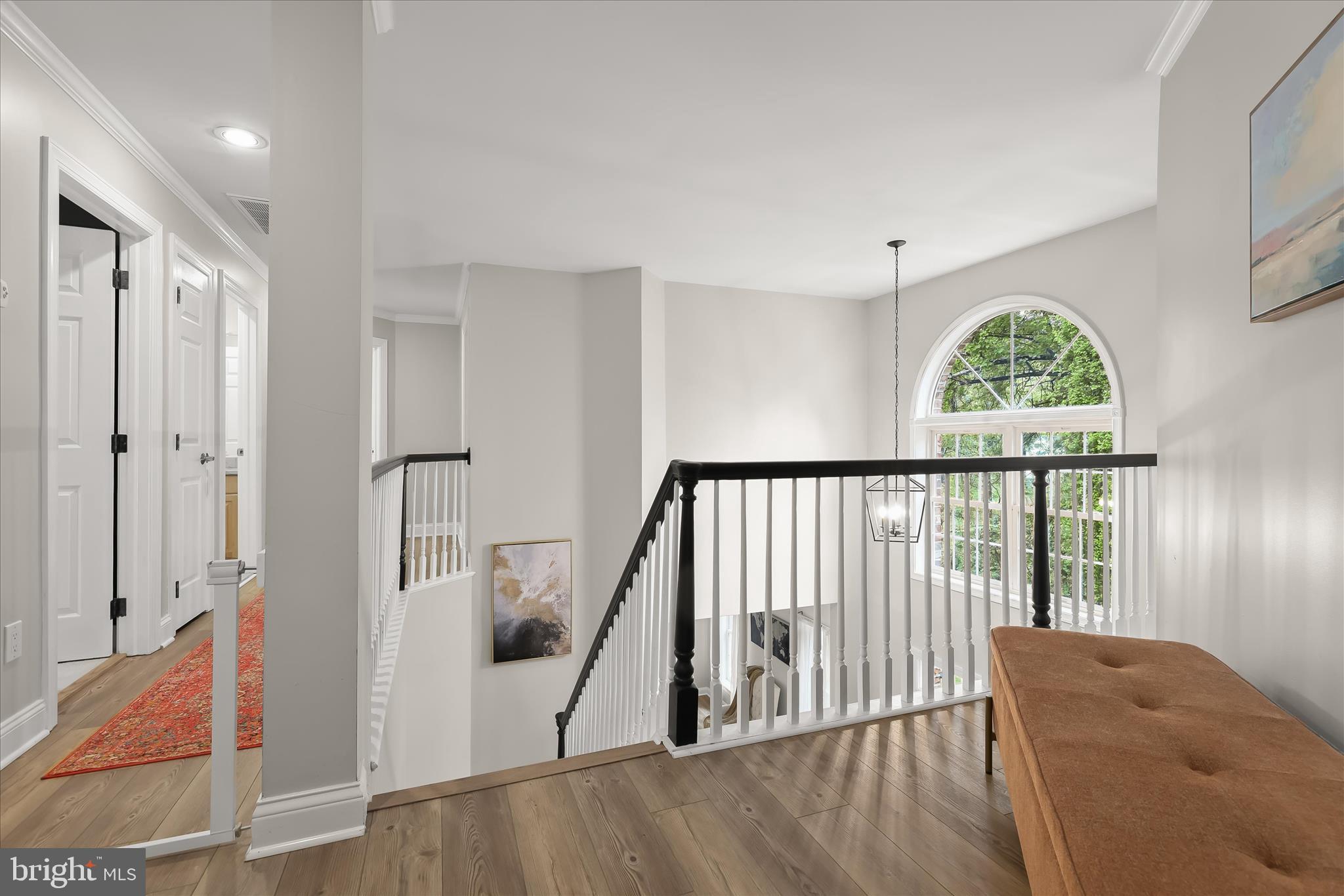 515 Garrison Forest Road Owings Mills, MD 21117 - Photo 33 of 84 a view of hallway with furniture and a floor to ceiling window