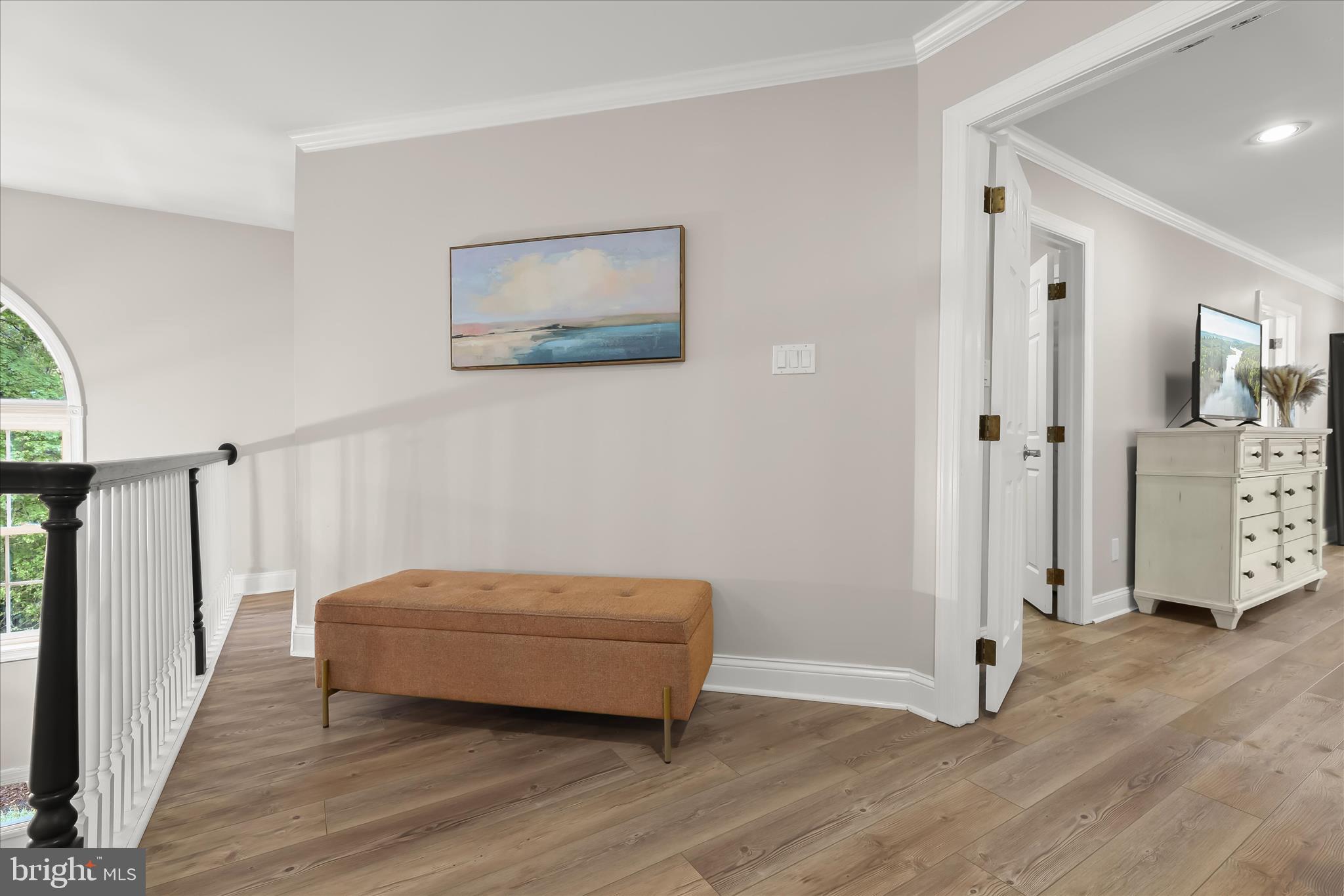 515 Garrison Forest Road Owings Mills, MD 21117 - Photo 34 of 84 a room with a bed and a chandelier