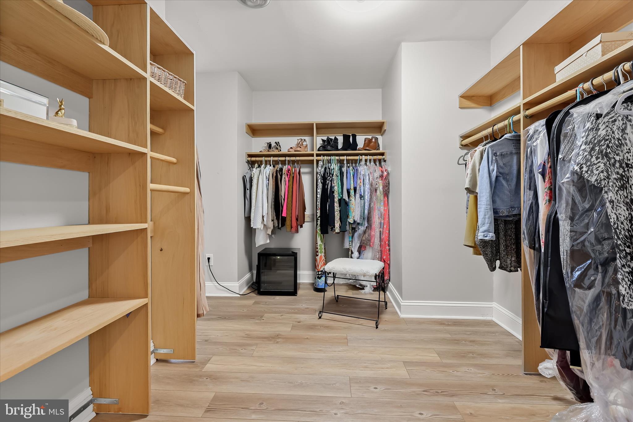 515 Garrison Forest Road Owings Mills, MD 21117 - Photo 45 of 84 a view of walk in closet with clothes and shoes