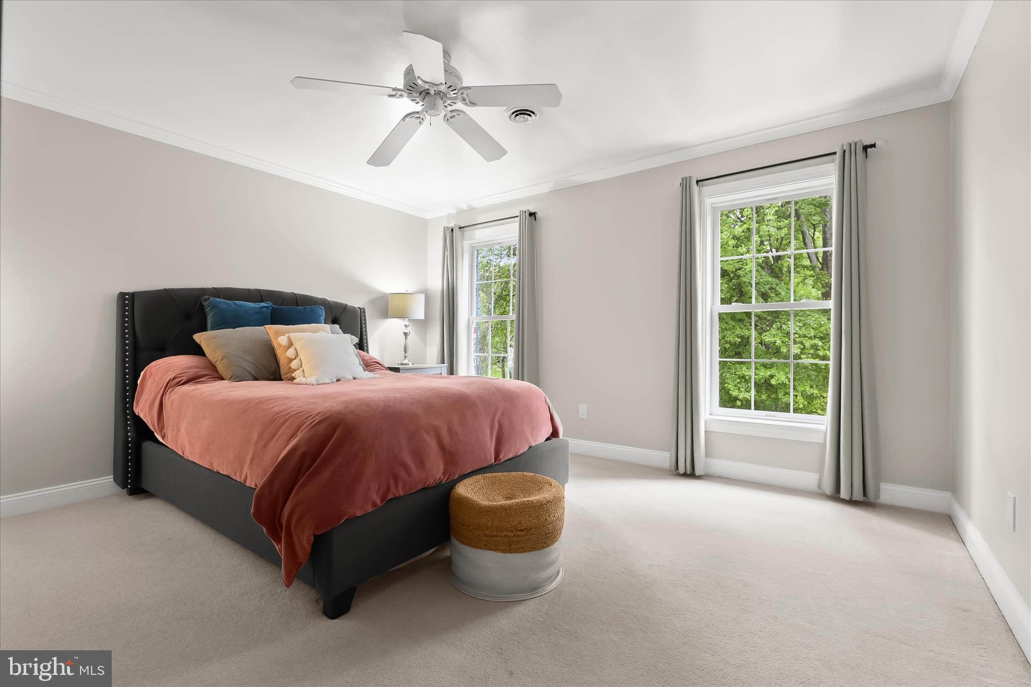 515 Garrison Forest Road Owings Mills, MD 21117 - Photo 46 of 84 a spacious bedroom with a bed and window
