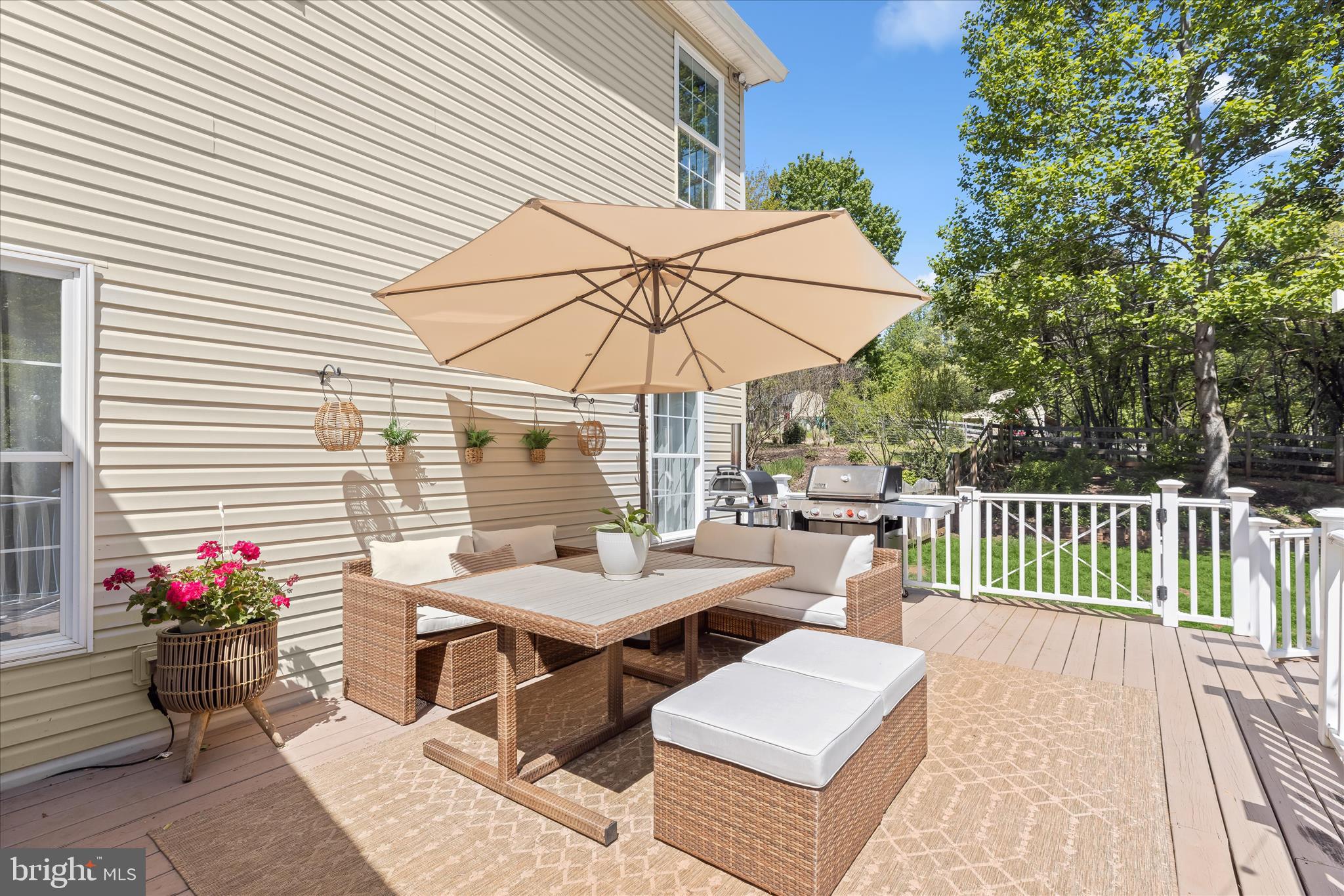 515 Garrison Forest Road Owings Mills, MD 21117 - Photo 70 of 84 a view of a patio with a table and chairs under an umbrella
