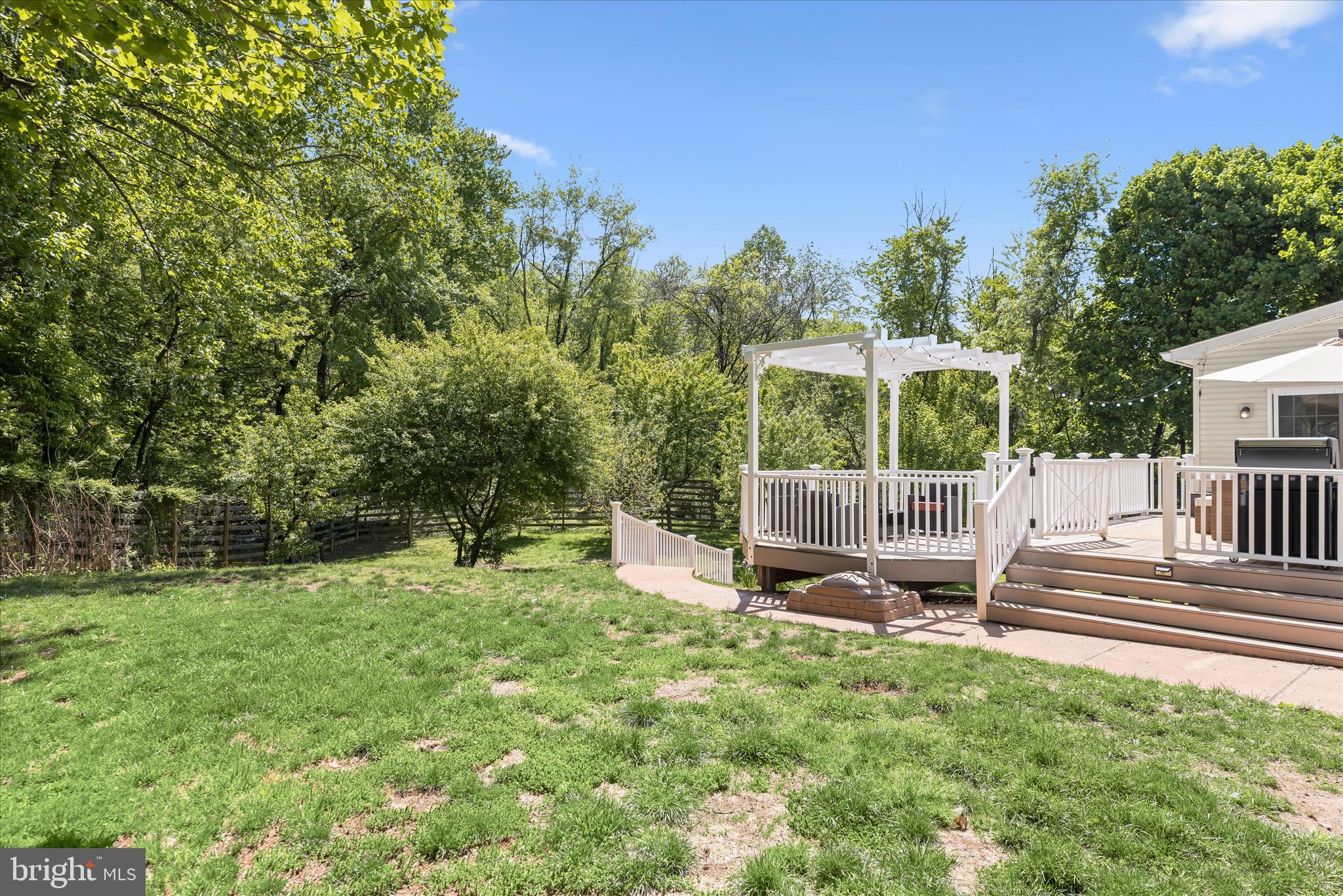 515 Garrison Forest Road Owings Mills, MD 21117 - Photo 75 of 84 a view of a chair and tables in the back yard