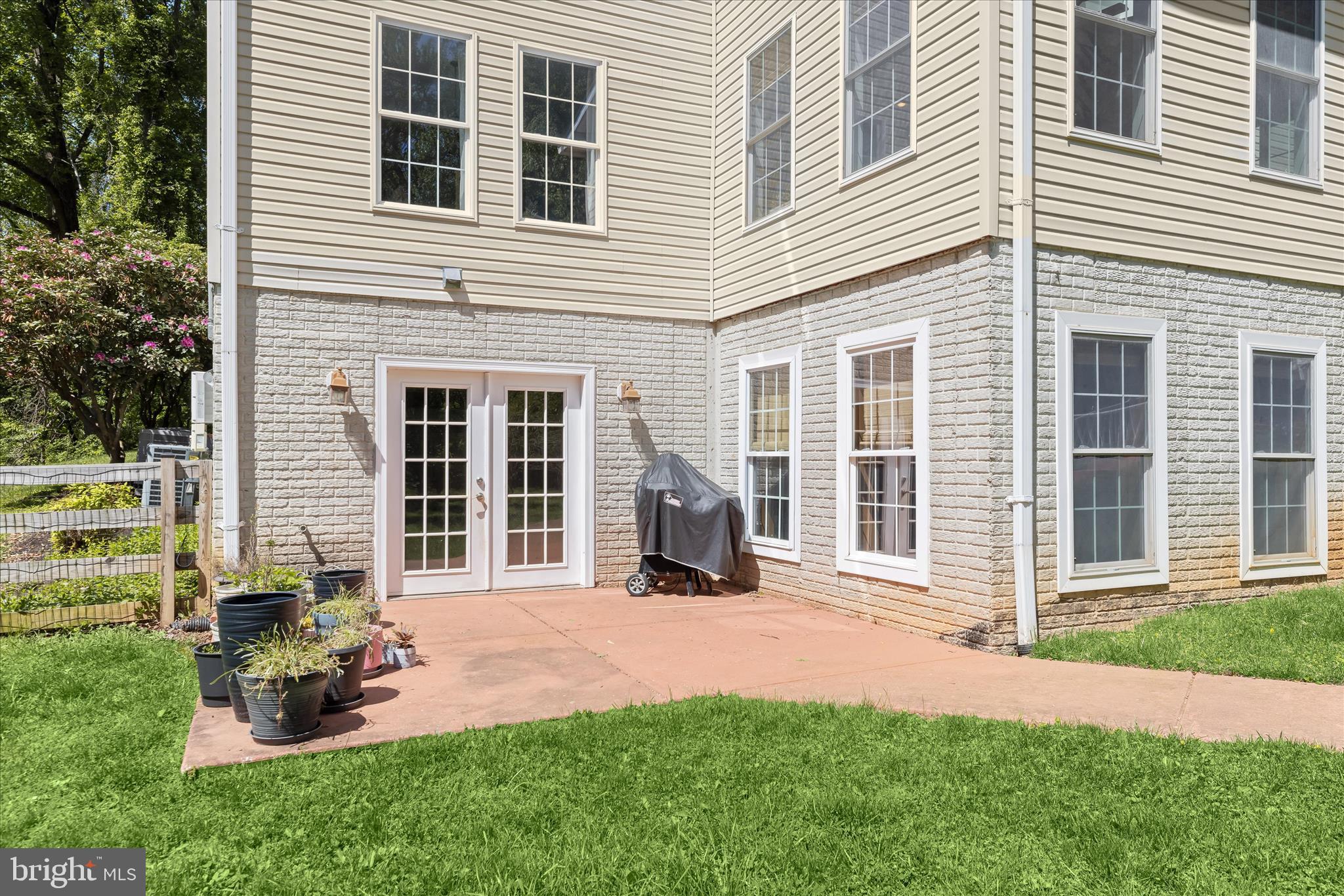 515 Garrison Forest Road Owings Mills, MD 21117 - Photo 77 of 84 a front view of a house with a yard and porch