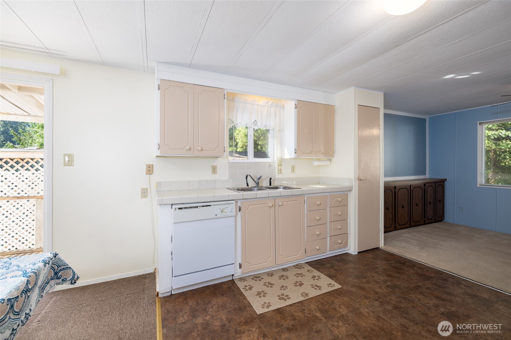 3333 228th Street Southeast, Unit 100 Bothell, WA 98021 - Photo 12 of 27 a kitchen with sink cabinets and window