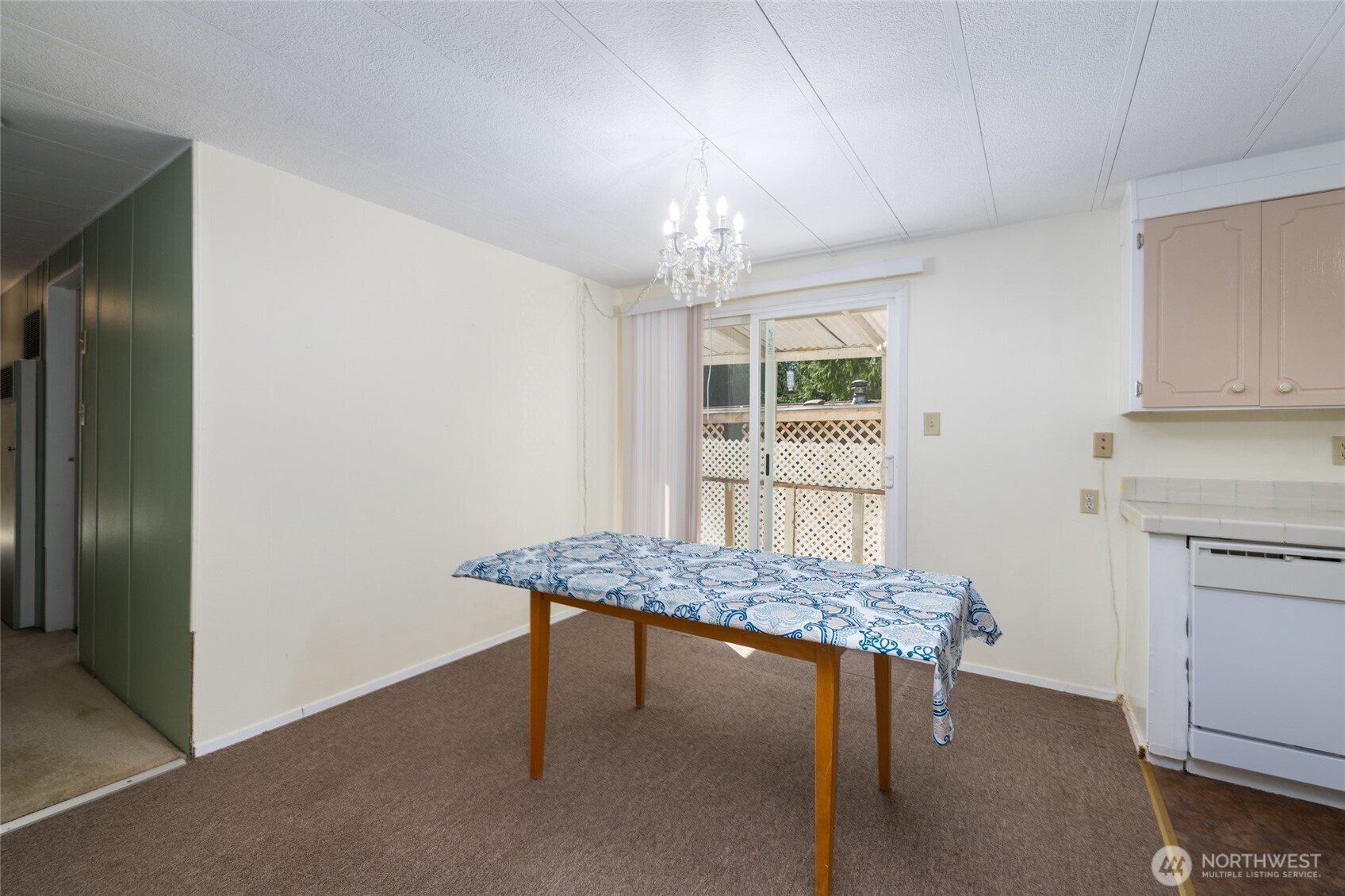 3333 228th Street Southeast, Unit 100 Bothell, WA 98021 - Photo 15 of 27 a room with furniture and window