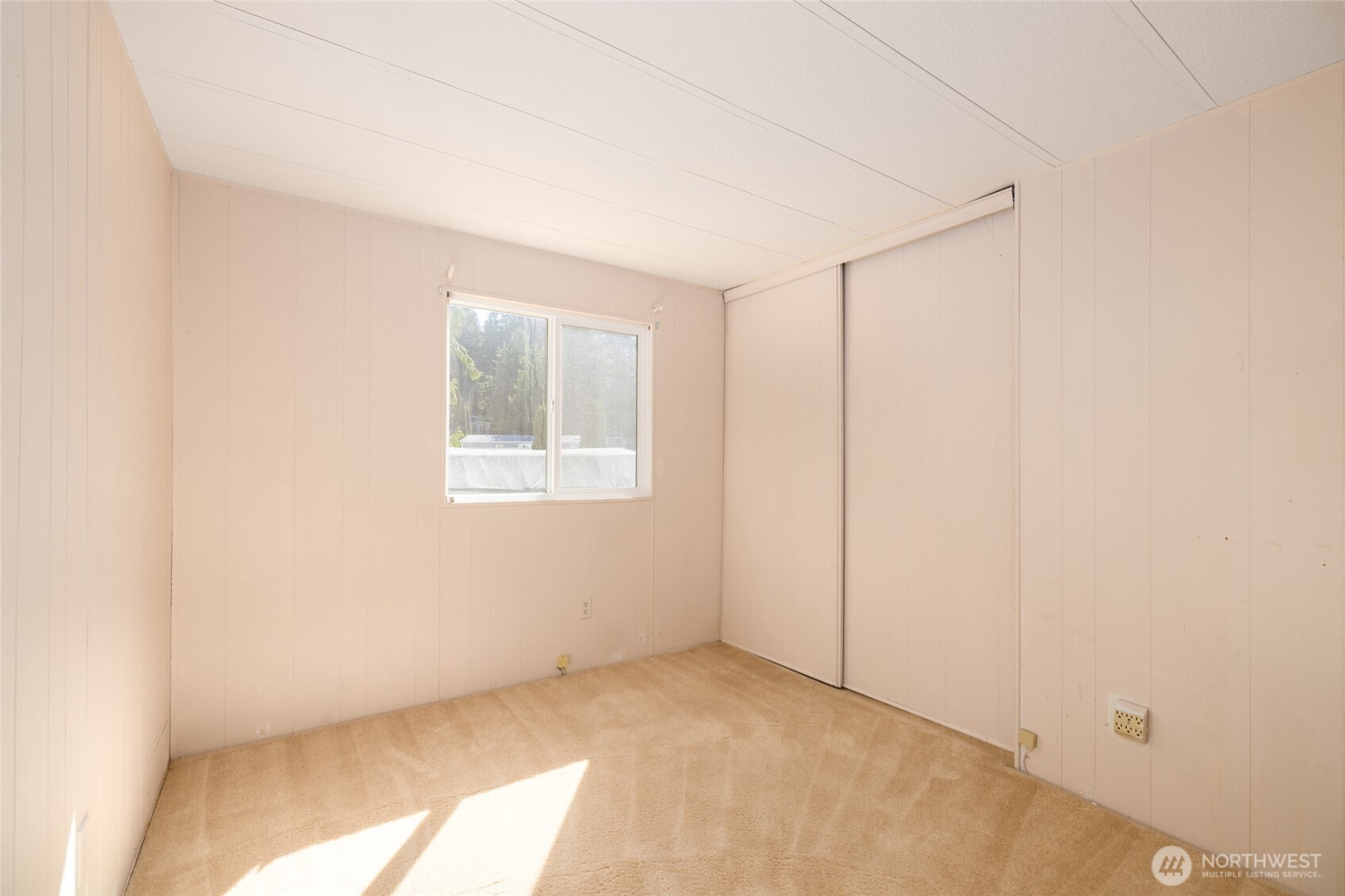 3333 228th Street Southeast, Unit 100 Bothell, WA 98021 - Photo 17 of 27 a view of an empty room with a window