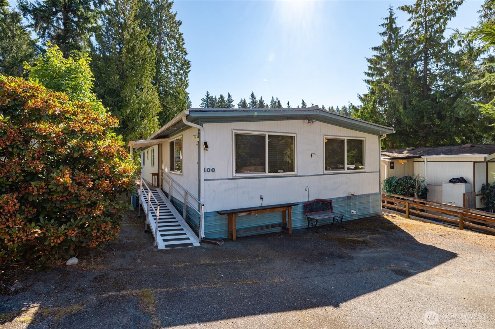 3333 228th Street Southeast, Unit 100 Bothell, WA 98021 - Photo 2 of 27 a view of a house with a yard