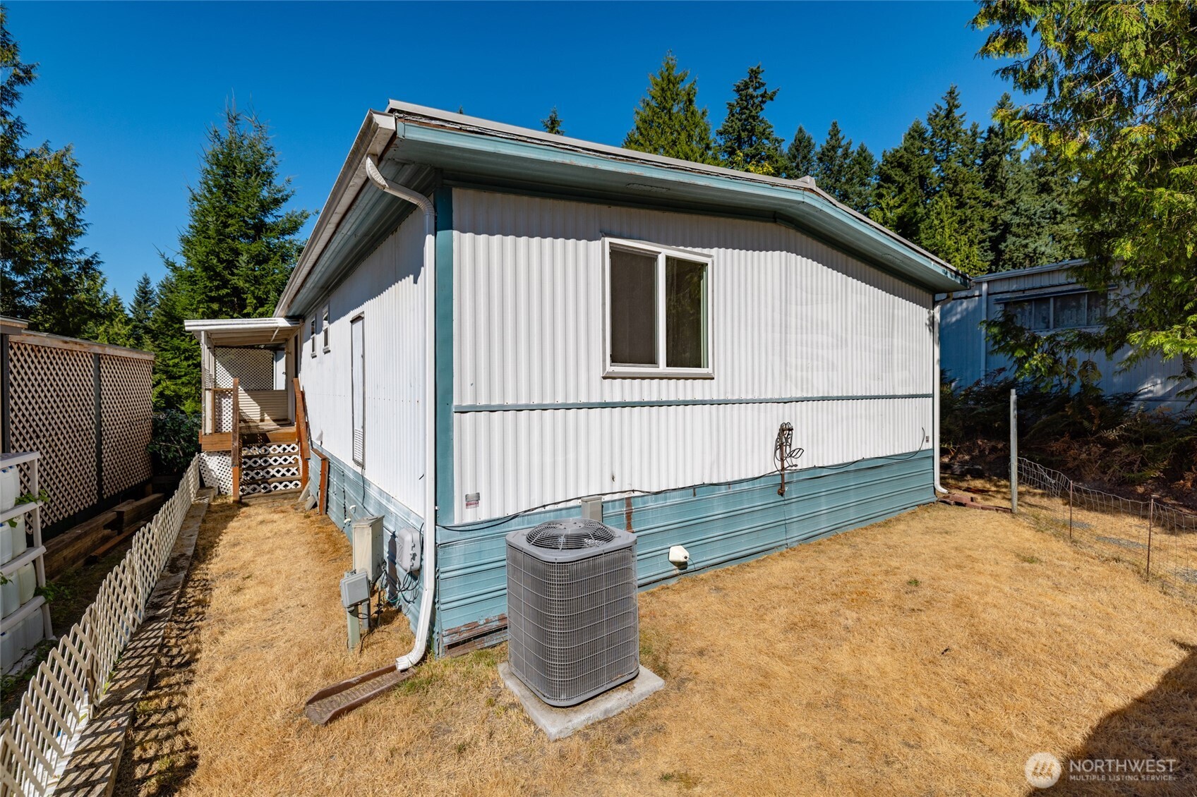 3333 228th Street Southeast, Unit 100 Bothell, WA 98021 - Photo 24 of 27 a backyard of a house with seating space