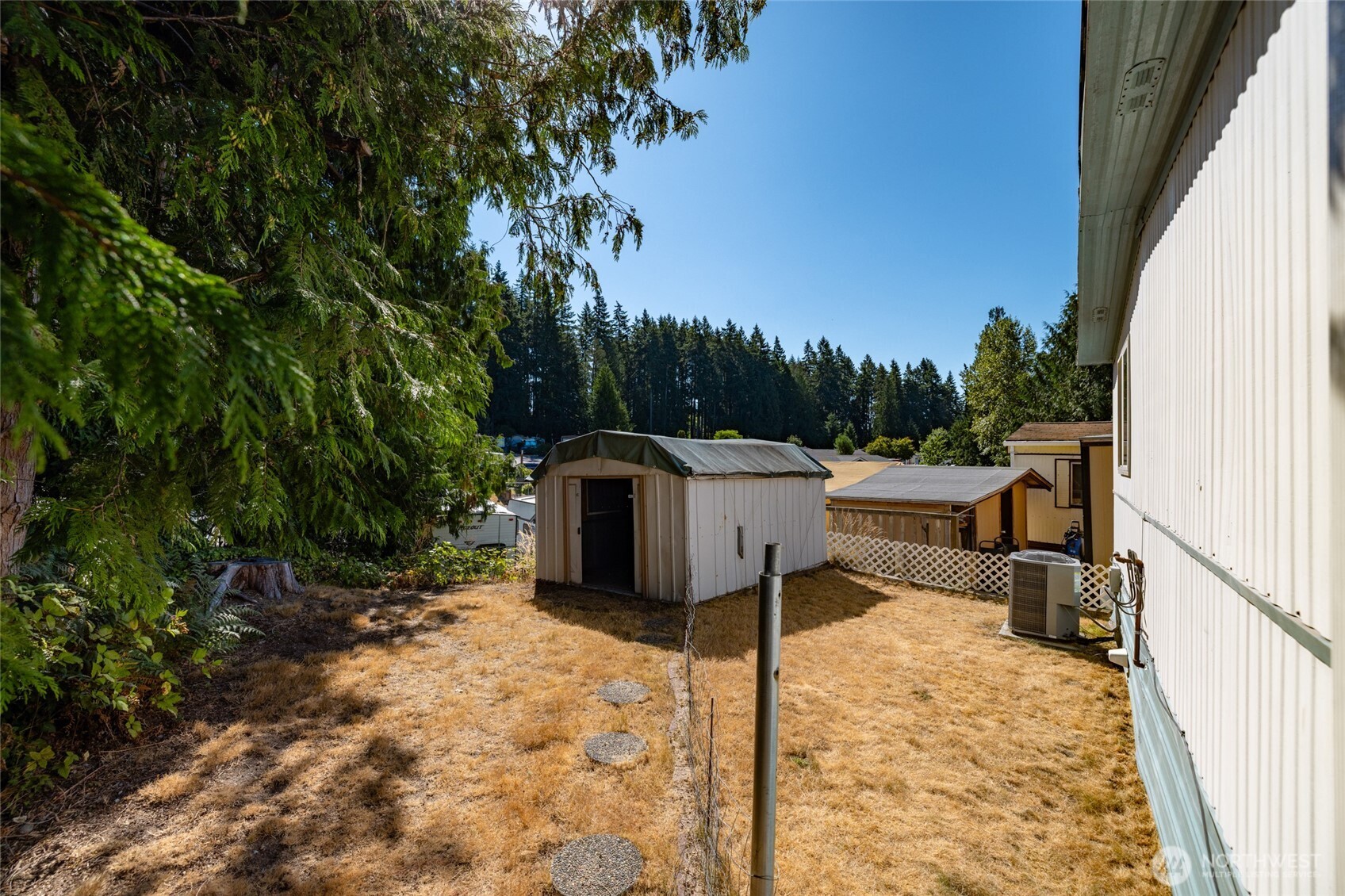 3333 228th Street Southeast, Unit 100 Bothell, WA 98021 - Photo 26 of 27 a view of a terrace with a sitting area