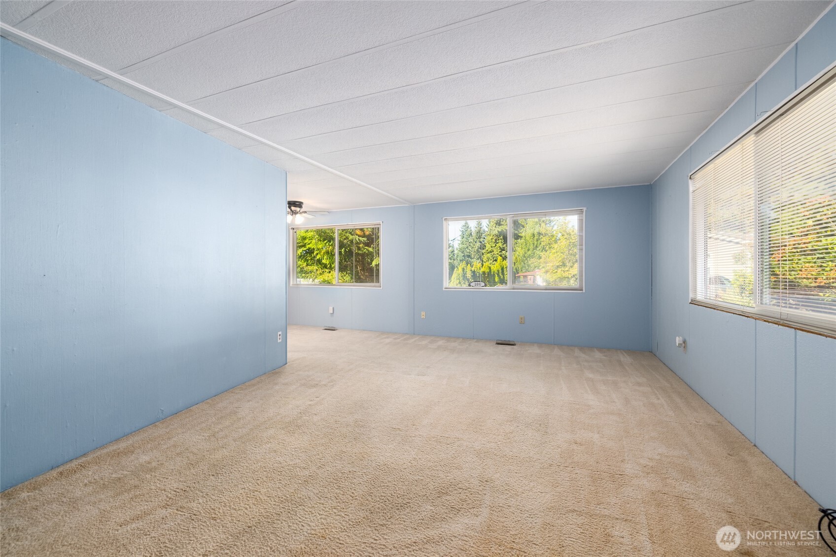 3333 228th Street Southeast, Unit 100 Bothell, WA 98021 - Photo 5 of 27 an empty room with windows