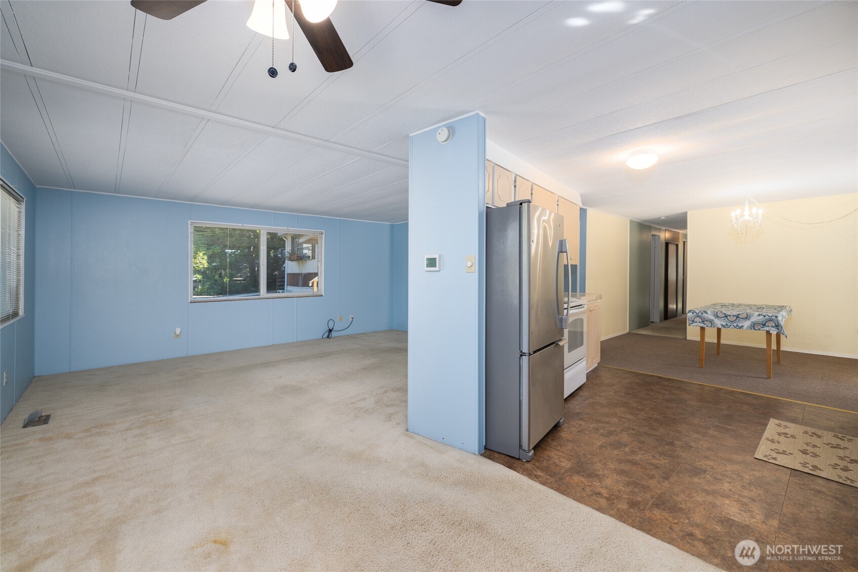 3333 228th Street Southeast, Unit 100 Bothell, WA 98021 - Photo 10 of 27 an empty room with windows and entrance