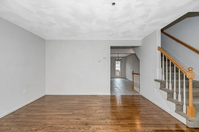 a view of gallery with wooden floor
