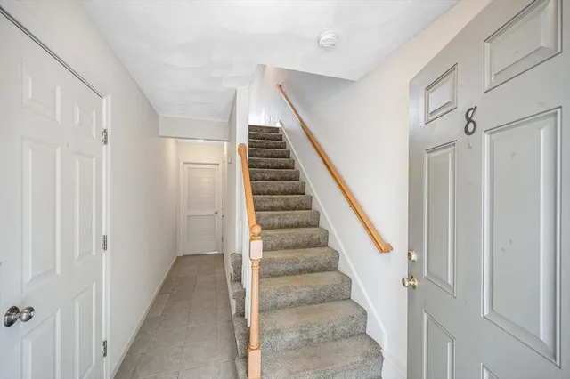 a view of staircase with white walls and white walls