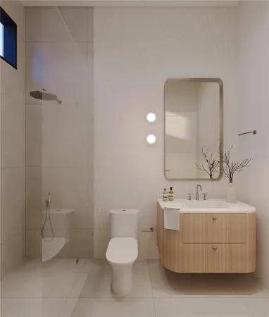 a bathroom with a sink mirror and toilet