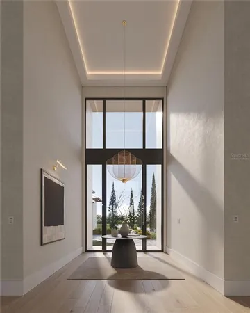 a view of living room filled with furniture and window