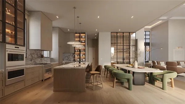 a large kitchen with a table and chairs