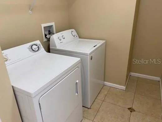 a view of a lake with houses in outdoor space