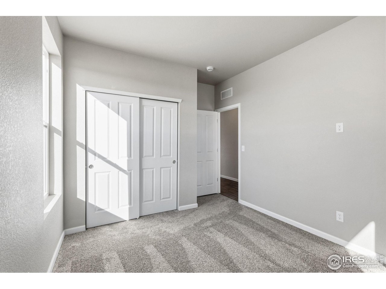 6793 Utica Court Firestone, CO 80504 - Photo 20 of 26 a view of an empty room