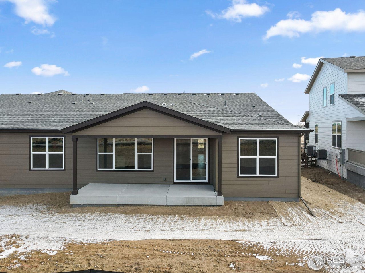 6793 Utica Court Firestone, CO 80504 - Photo 24 of 26 a view of a house with a yard