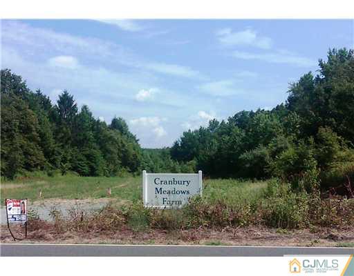 155 Dey Road Cranbury, NJ 08512 - Photo 2 of 6 a view of a street with a sign board