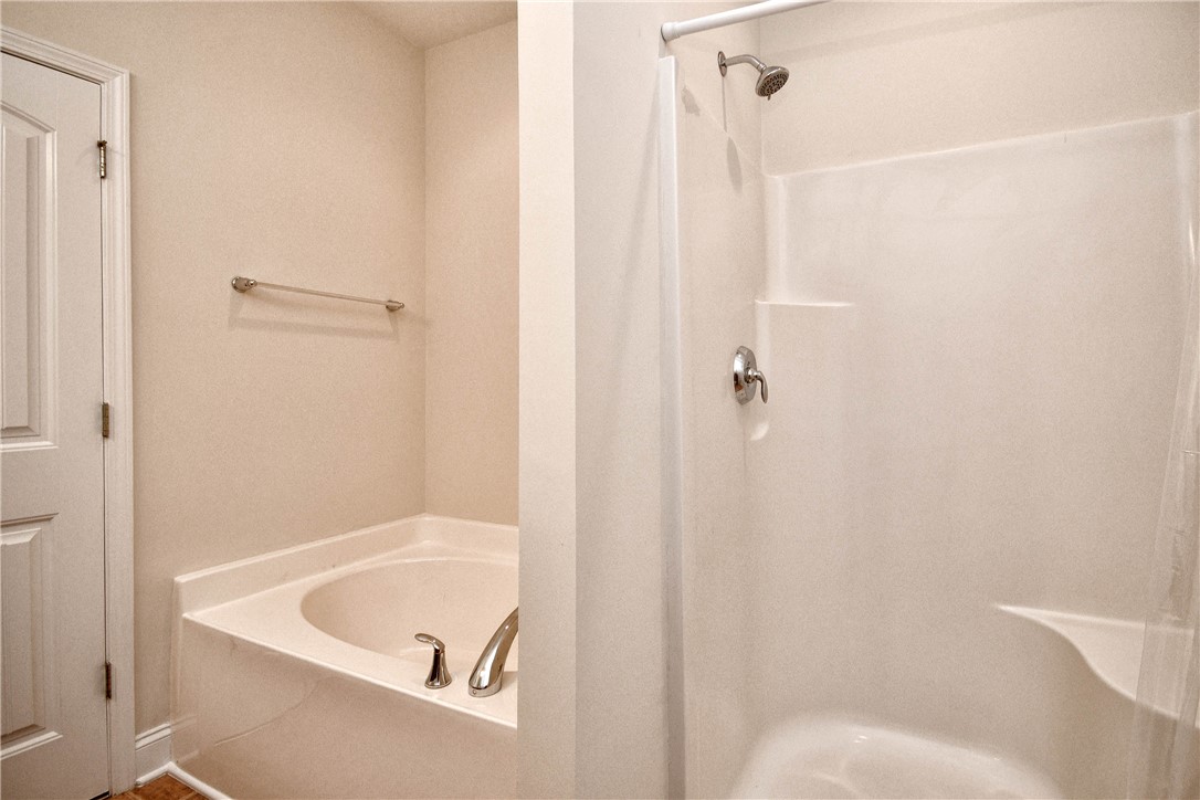 47 Hillsborough Drive Anderson, SC 29621 - Photo 12 of 23 This bathroom features a deep soaking tub and a spacious shower.