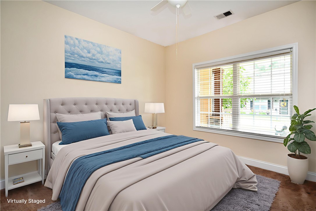 47 Hillsborough Drive Anderson, SC 29621 - Photo 14 of 23 This spacious bedroom offers a tranquil retreat with abundant natural light and a serene ambiance.