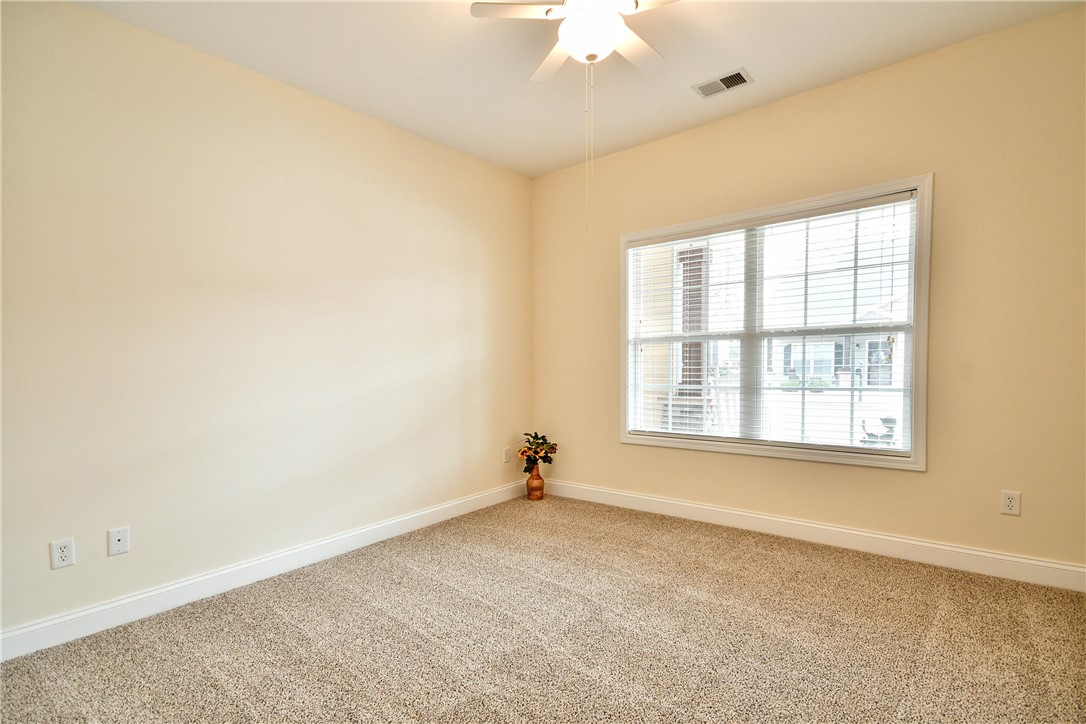 47 Hillsborough Drive Anderson, SC 29621 - Photo 15 of 23 This spacious room features a large window and plush, new carpeting, ready for your personal touch.