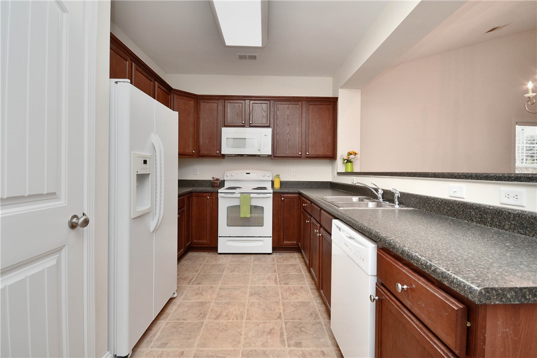 47 Hillsborough Drive Anderson, SC 29621 - Photo 2 of 23 This functional kitchen features ample cabinetry and modern appliances, perfect for daily living.