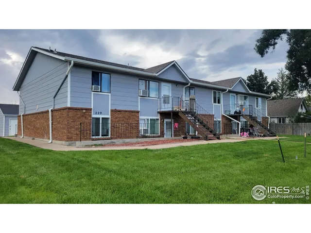 a black and white photo of a house