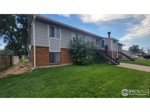 a black and white photo of a house