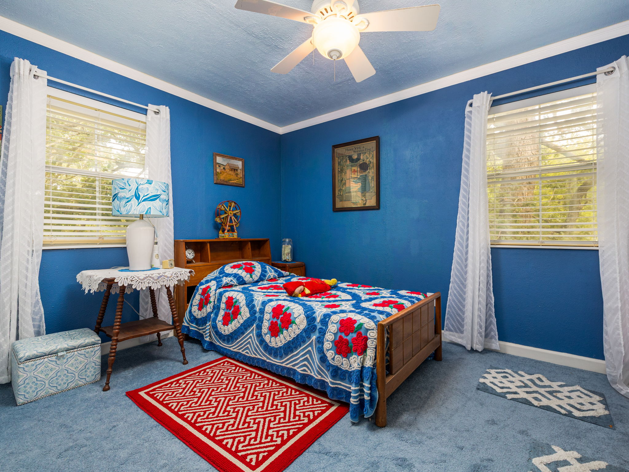 1065 Private Road 7041 Elgin, TX 78621 - Photo 19 of 38 Bedroom featuring soft carpet flooring, elegant crown molding, a ceiling fan, and a textured ceiling, creating a comfortable and inviting space