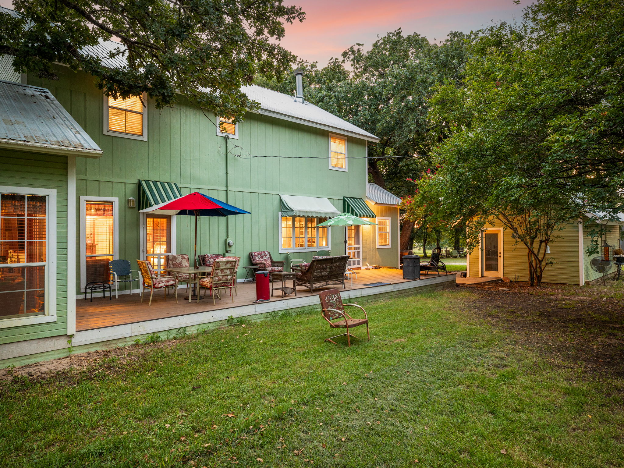 1065 Private Road 7041 Elgin, TX 78621 - Photo 23 of 38 View of the spacious back deck, showcasing ample room for outdoor living and entertaining