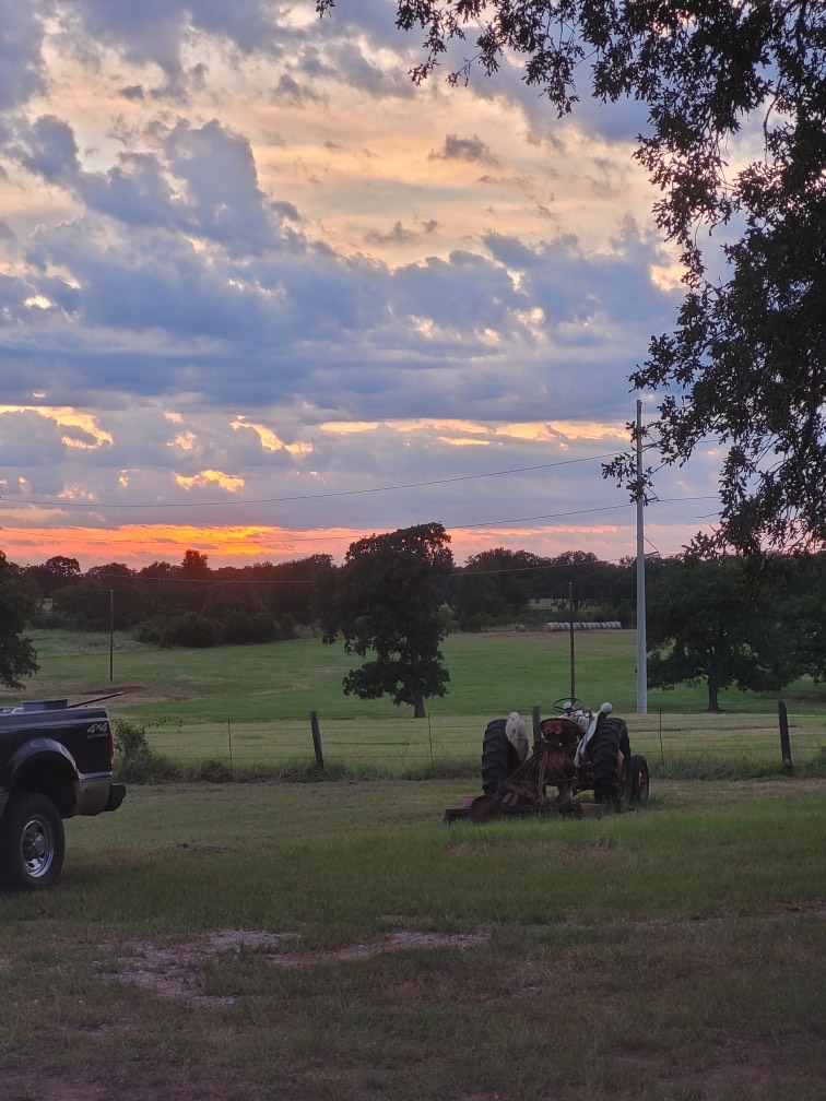1065 Private Road 7041 Elgin, TX 78621 - Photo 27 of 38 Gorgeous Texas sunset captured from the front of the home. Imagine relaxing every evening on your porch swing, enjoying this breathtaking view night after night