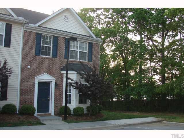 107 Galimore Way Apex, NC 27502 - Photo 1 of 12 a front view of a house with garden
