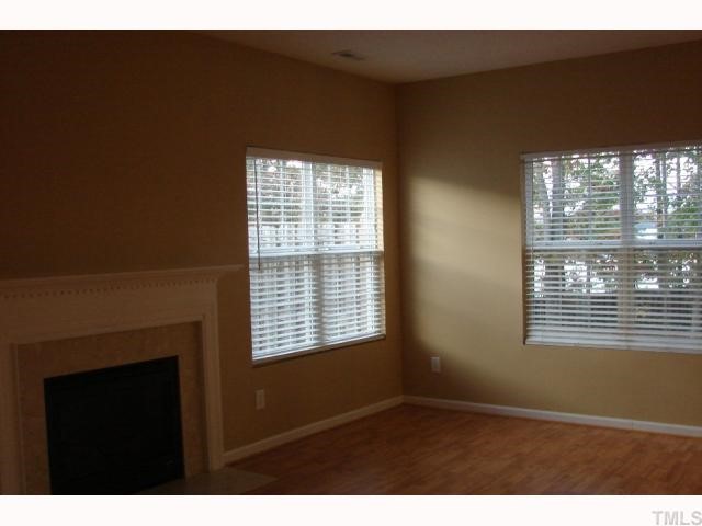 107 Galimore Way Apex, NC 27502 - Photo 5 of 12 a view of an empty room with a window