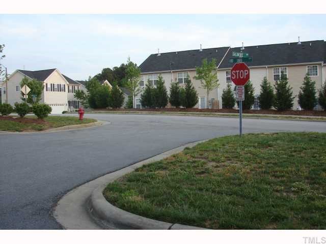 107 Galimore Way Apex, NC 27502 - Photo 10 of 12 a view of street with houses