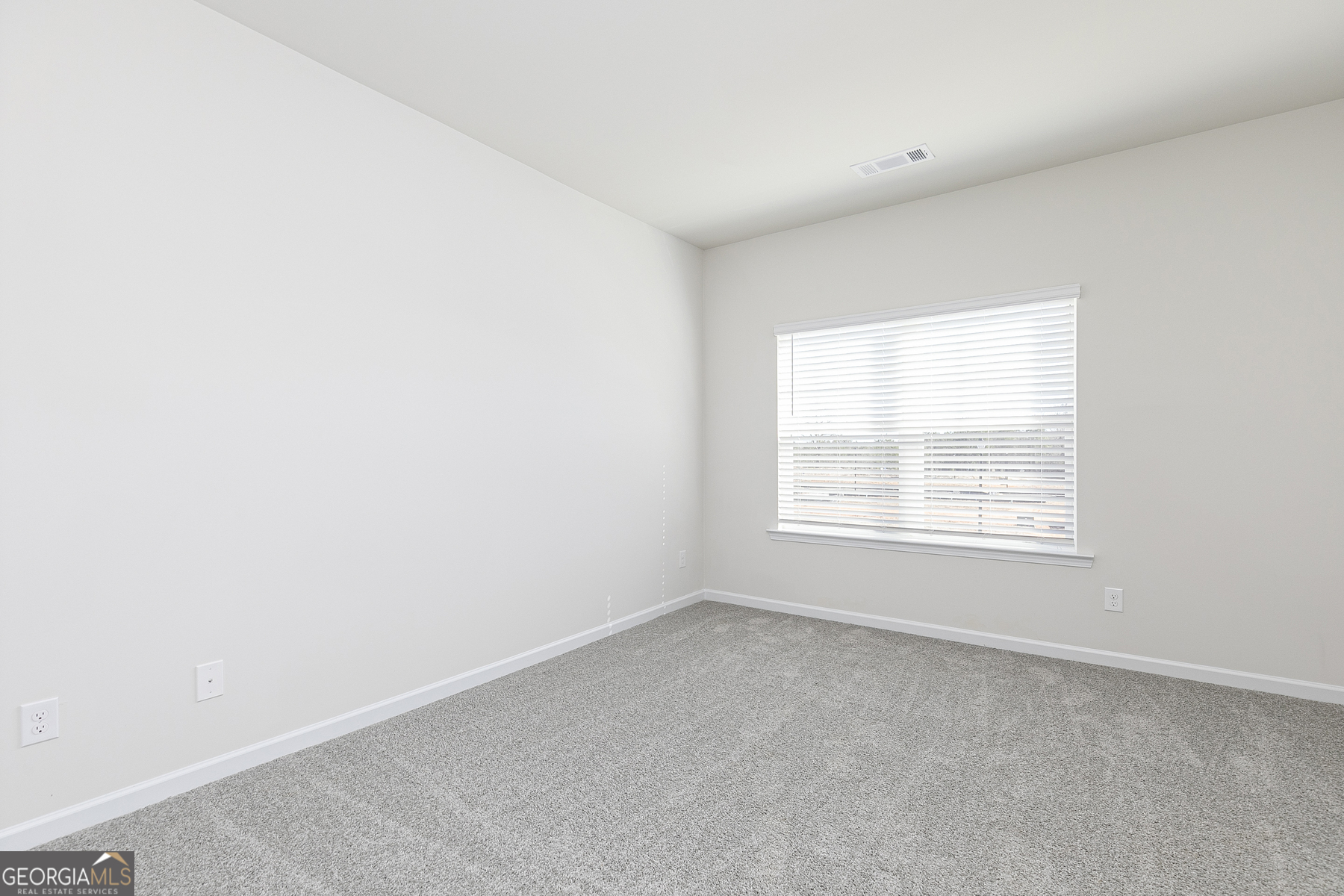 228 Rooker Drive LaGrange, GA 30241 - Photo 11 of 17 an empty room with a window