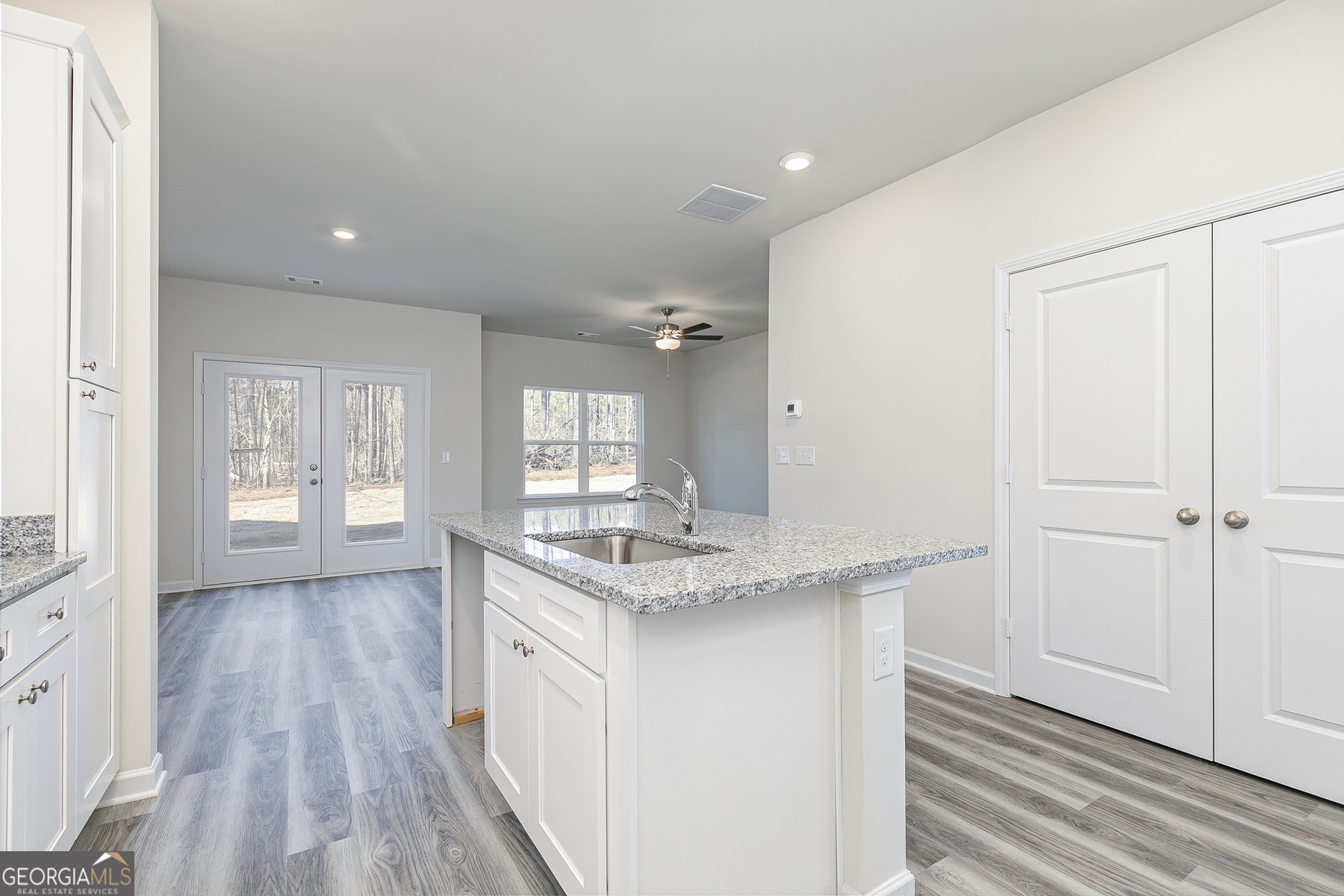 228 Rooker Drive LaGrange, GA 30241 - Photo 6 of 17 a kitchen with a sink stove and cabinets