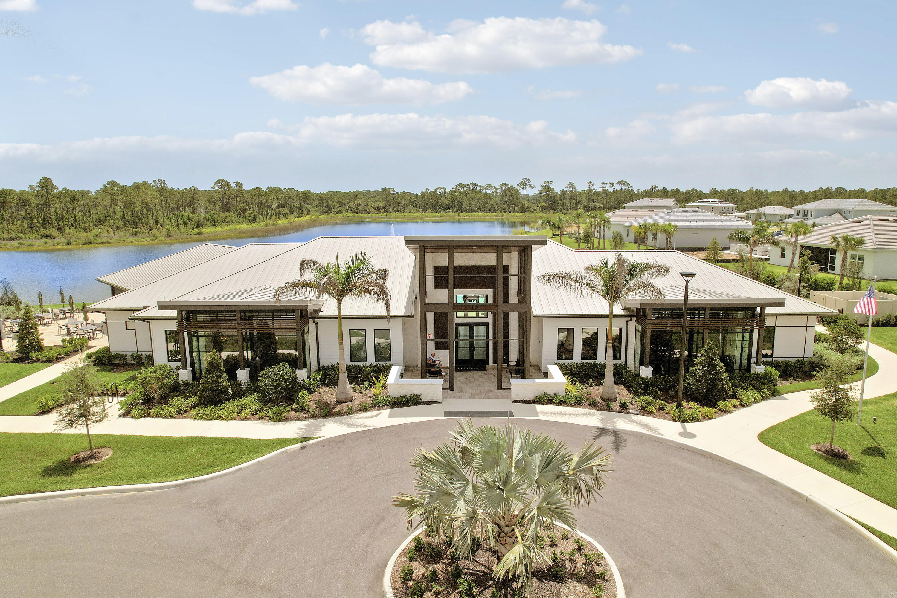9775 Southwest Meridian Way Stuart, FL 34997 - Photo 36 of 49 a view of a lake with tall buildings
