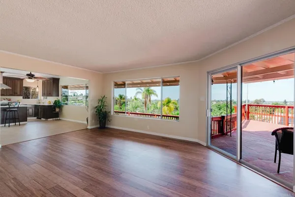 a view of a living room and hardwood floor