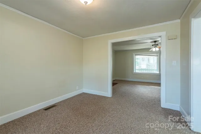 an empty room that has a window