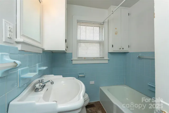 a bathroom with a bathtub