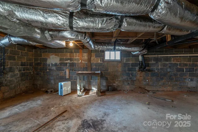 a view of a room with wooden racks